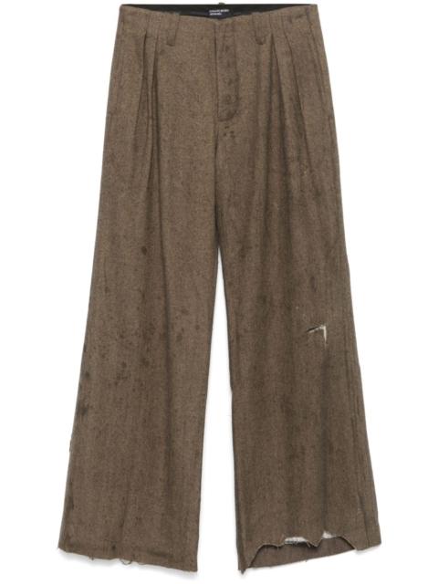 oil-stained wide-leg trousers