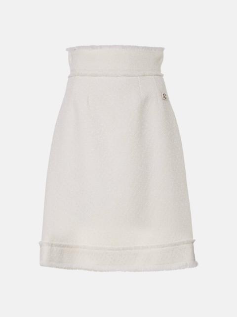 High-rise wool-blend tweed midi skirt