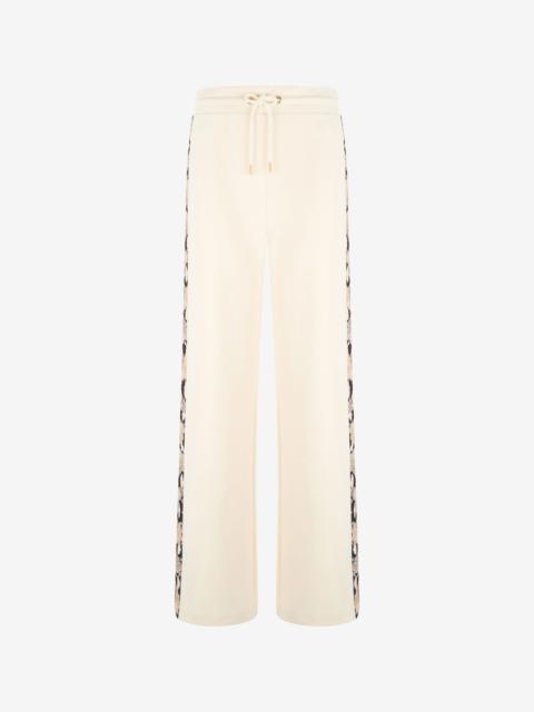 Trousers with snake bands