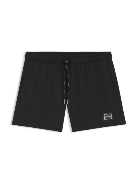 FULLY LINED SWIM SHORTS WITH LOGO DETAIL