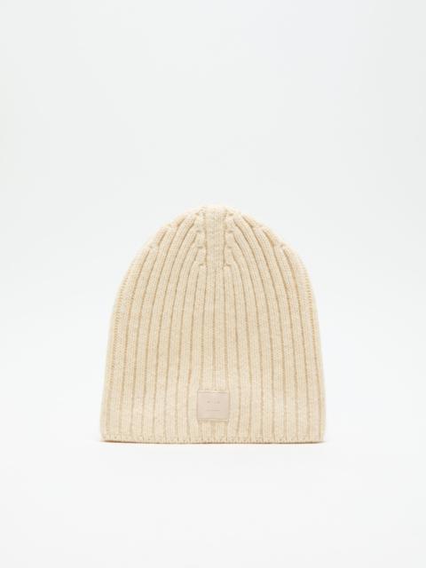 Knitted beanie - Oatmeal melange