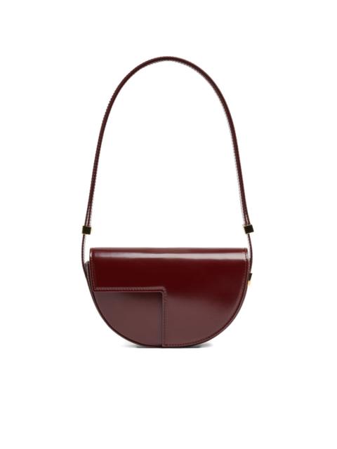 Le Patou half-moon leather shoulder bag