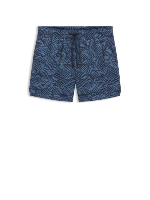 SWIM SHORTS WITH LOGO ARTWORK