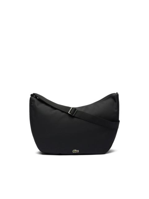 crescent-shaped zip-top cross body bag