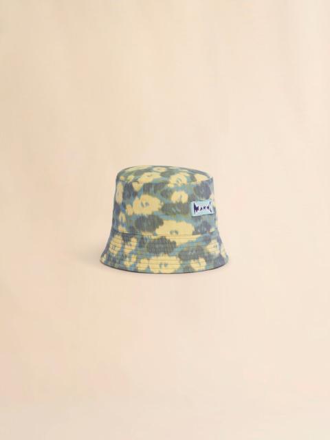 GREEN LINEN BLEND BUCKET HAT WITH BLURRY FLORAL PRINT
