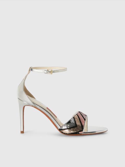 Sandal with adjustable strap and zig zag pattern