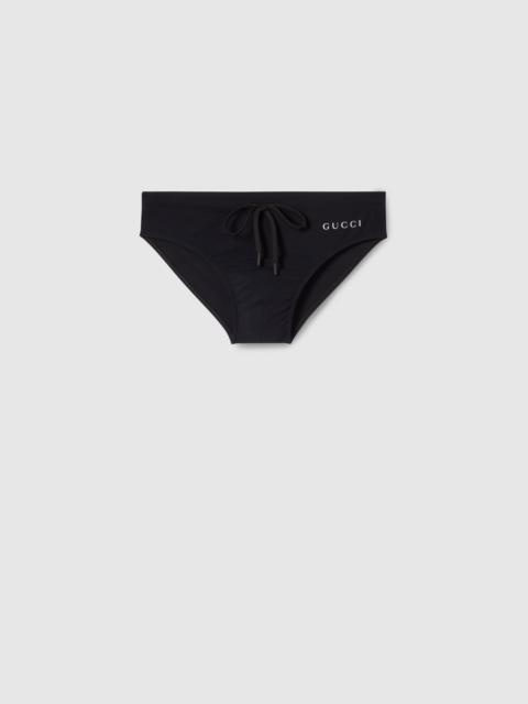 Elastane swim briefs with print
