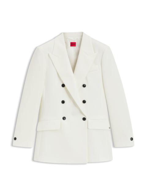 RELAXED-FIT DOUBLE-BREASTED BLAZER IN STRETCH TWILL