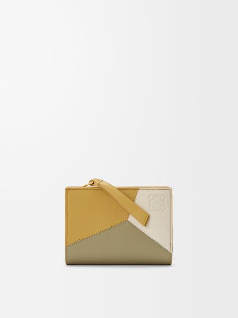 Puzzle compact wallet in classic calfskin