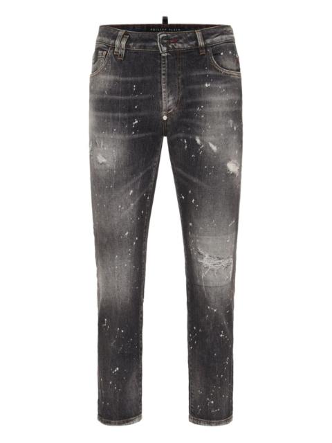 paint-splatter distressed jeans