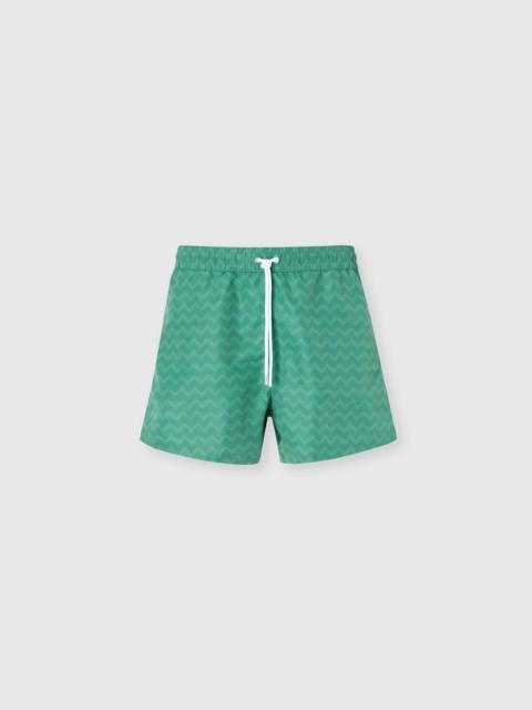 Mid-length swim shorts with tone-on-tone zigzag print
