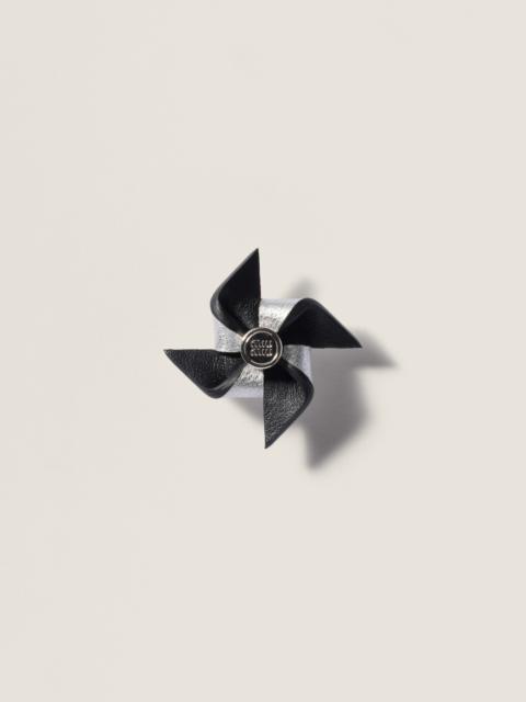Leather pinwheel brooch