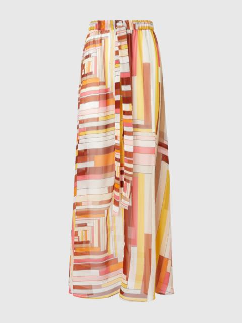 Long covered up skirt in printed silk with front closure