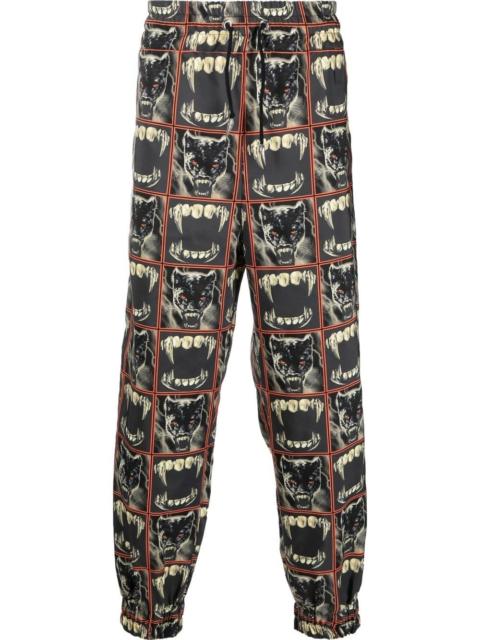 panther print track pants