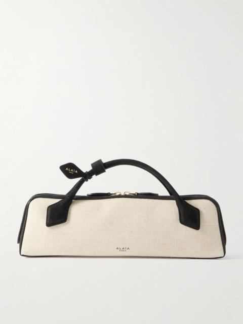 Le Teckel Leather-trimmed Canvas Clutch