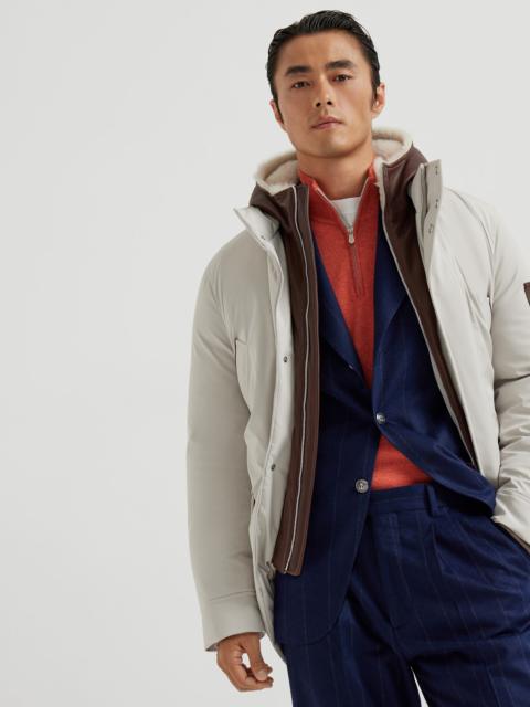 Stretch bonded nylon parka with down padding and detachable bib with shearling-lined hood