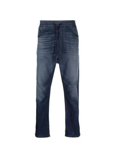 drop-crotch tapered jeans
