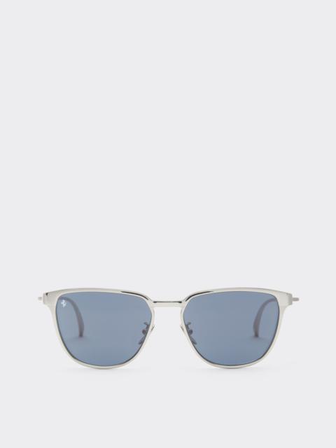 Ferrari sunglasses in  silver-coloredmetal  with blue crystal lenses