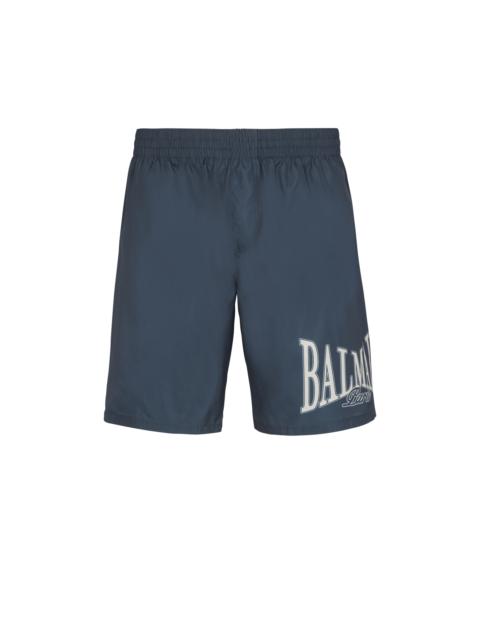Swim shorts with Balmain College logo