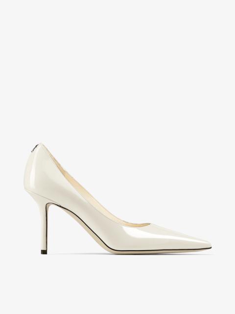 Love 85
Latte Patent Leather Pumps with JC Emblem