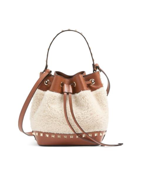 Rockstud shearling bucket bag