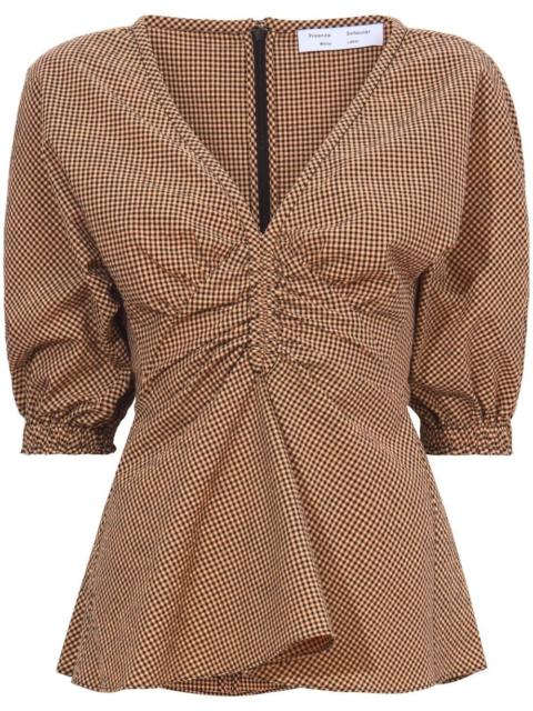 Gingham long sleeve peplum top