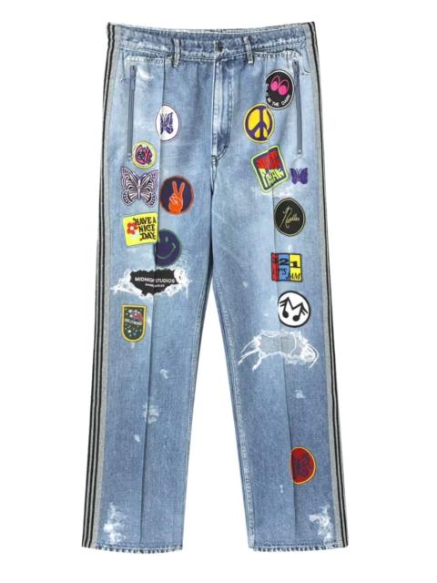 patch-detailing track jeans