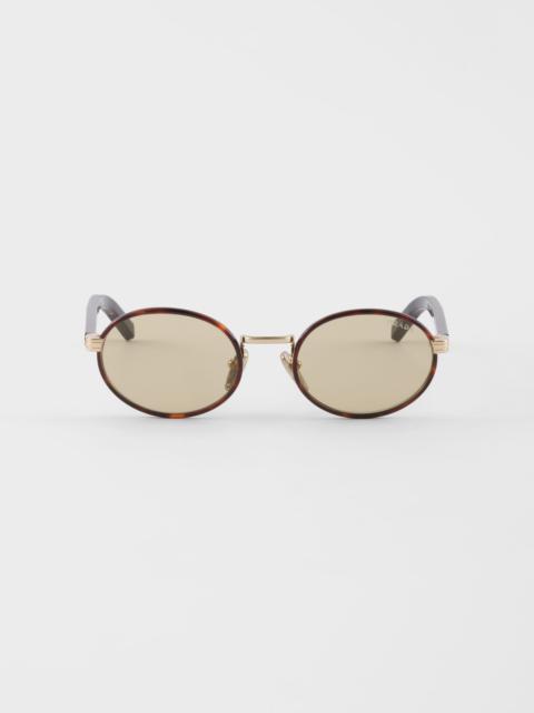 Prada sunglasses with the iconic metal plaque