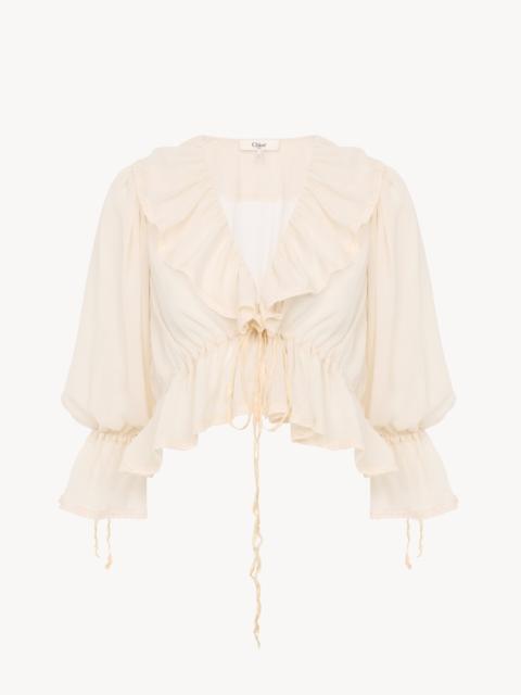 CROPPED V-NECK RUFFLE TOP IN SILK GEORGETTE & LACE