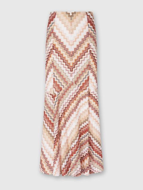 Long flared skirt with lamé serrated zig zag pattern