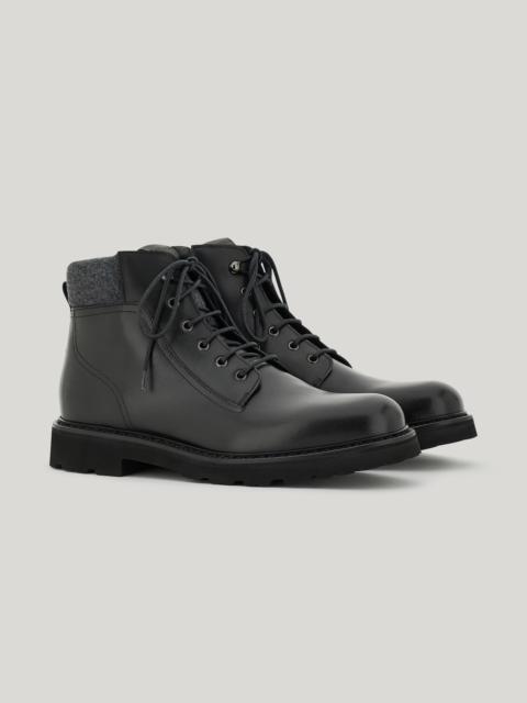 BLACK CALFSKIN ANKLE BOOT WITH PADDED WOOL DETAIL