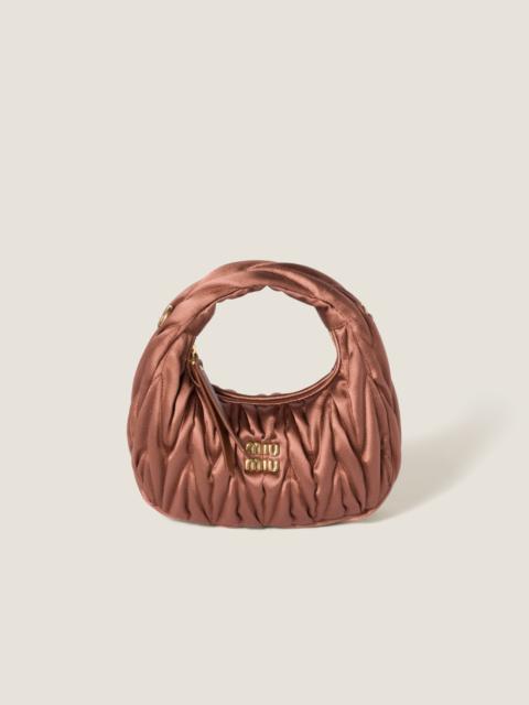 Wander matelassé satin mini-bag