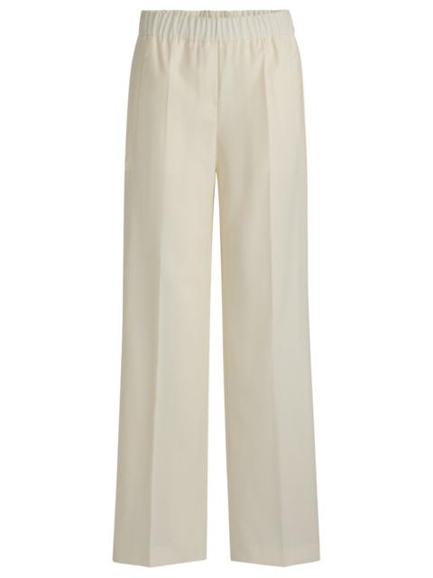 RELAXED-FIT TROUSERS IN WOOL