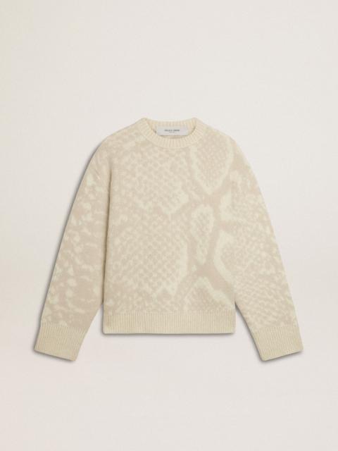 Women’s beige CNY sweater with patterns