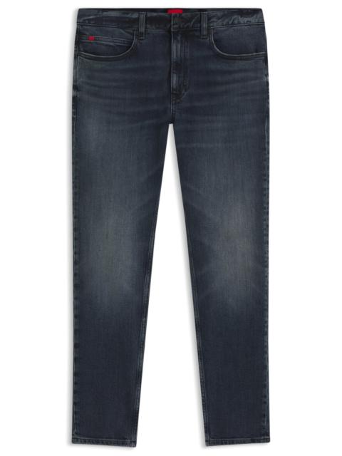EXTRA-SLIM-FIT JEANS IN MID-BLUE STRETCH DENIM