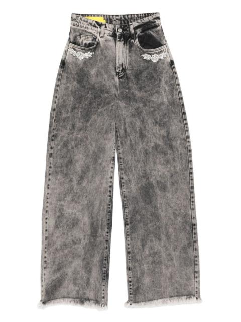 floral-appliqué frayed jeans