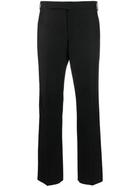 pressed-crease tapered-leg trousers