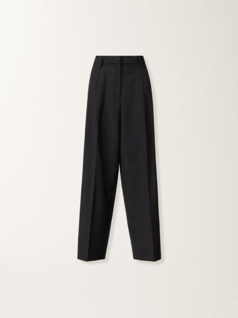 Fluid techno-tailored pants in midnight blue