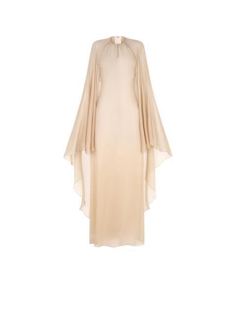 EVENING DRESS WITH KEYHOLE NECKLINE AND ASYMMETRIC CAPE
