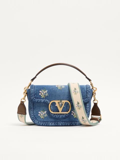 VALENTINO GARAVANI ALLTIME MEDIUM SHOULDER BAG IN EMBROIDERED DENIM WITH EMBROIDERED RIBBON STRAP