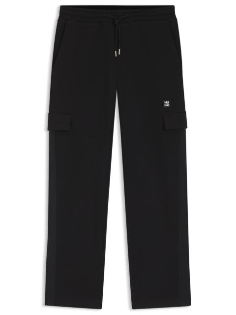 GEOMETRIC-TAPE TRACKSUIT BOTTOMS IN A COTTON BLEND