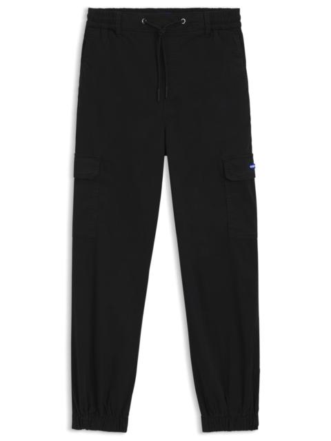 RELAXED-FIT PANTS IN WASHED STRETCH COTTON