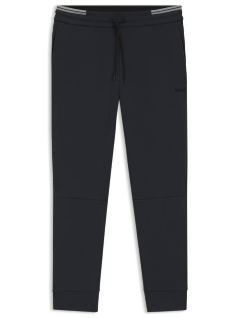 COTTON TRACKSUIT BOTTOMS WITH STRIPED TRIMS