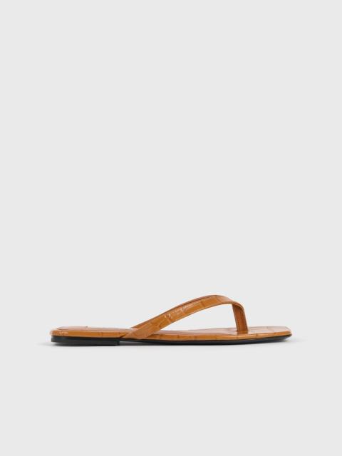 Croco-embossed flip flops tangerine