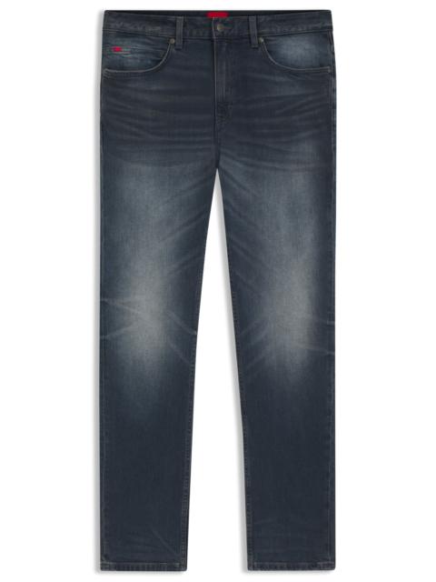 SLIM-FIT JEANS IN USED-EFFECT BLUE STRETCH DENIM