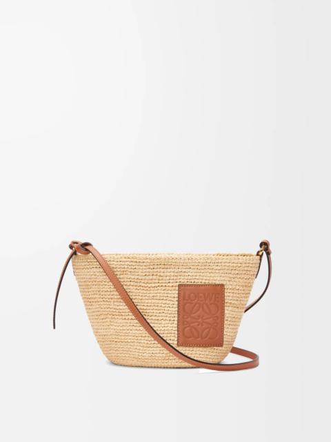 Pochette bag in raffia and calfskin