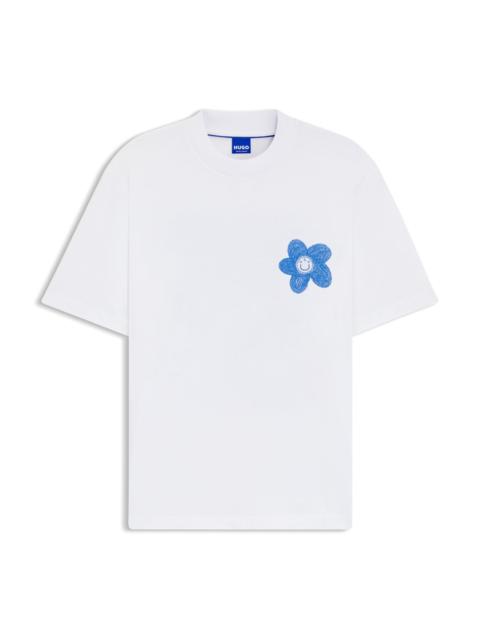 COTTON-JERSEY T-SHIRT WITH HAPPY HUGO LOGO ARTWORK
