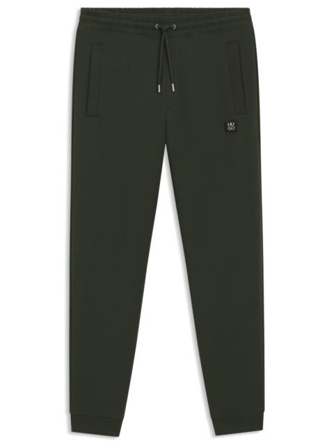COTTON TRACKSUIT BOTTOMS WITH STACKED LOGO