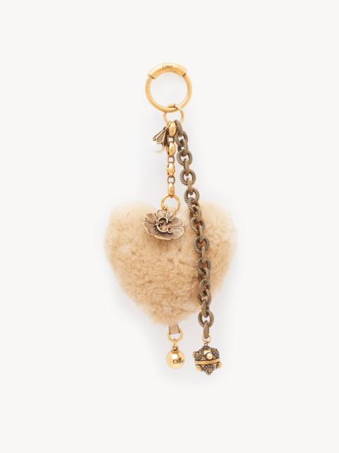 CHLOÉ SYMBOLS HEART SHEARLING BAG CHARM IN BRASS