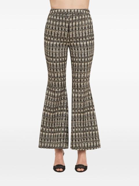 optical bouclé flared trousers